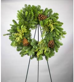 Christmas Wreath. An arrangement by Just Roses Flowers and More.