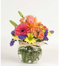 Happiness. An arrangement by A Plus Flowers and Gifts.