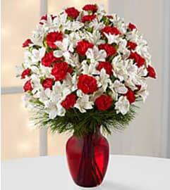Gorgeous Holiday Bouquet. An arrangement by Shalimar Flower Shop. Gorgeous Holiday Bouquet. An arrangement by Shalimar Flower Shop.