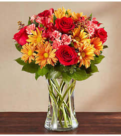 Sunlit Autumn Medley™. An arrangement by Graceland Florist.