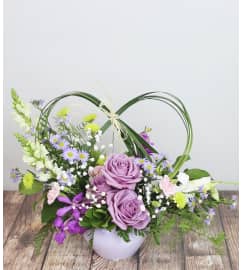 Falling In Love. An arrangement by Pike Creek Flower and Gift Shoppe.