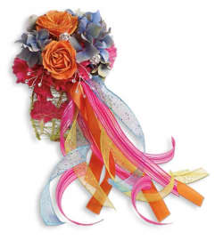 You Glow Corsage. An arrangement by Devine Orchid.