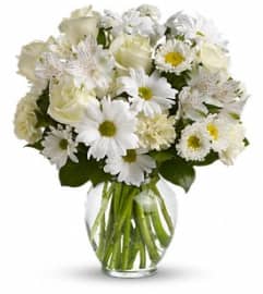 ALL WHITE ARRANGMENT. An arrangement by Marianna's Flower Island.