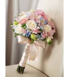 The FTD® Sweet Innocence™ Bouquet. An arrangement by Mystic Garden Floral.