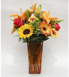 Zesty Orange. An arrangement by Flowers by Peter.