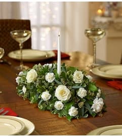 All White Centerpiece with Candles. An arrangement by Blessing and Blooms Florist.