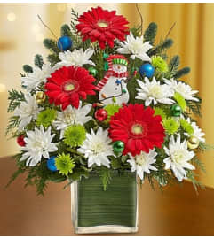 Christmas Greetings™. An arrangement by Graceland Florist.