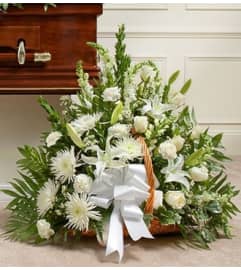 Thoughts and Prayers™ White Fireside Basket. An arrangement by Blessing and Blooms Florist.