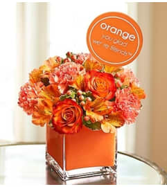 Orange You Glad We’re Friends™. An arrangement by Blessing and Blooms Florist.