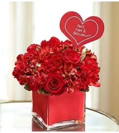 Red, Hot and Fabulous™. An arrangement by Blessing and Blooms Florist.