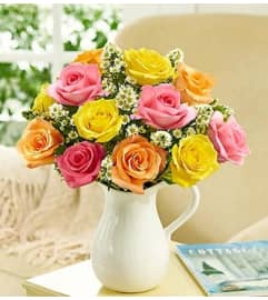 Pitcher Full of Roses, Assorted. An arrangement by Blessing and Blooms Florist.