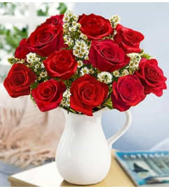 Home of the Brave™. An arrangement by Blessing and Blooms Florist.
