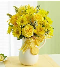 Make Lemonade™ in a Pitcher. An arrangement by Blessing and Blooms Florist.