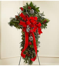Sympathy Cross in Christmas Colors. An arrangement by Graceland Florist.