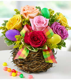 Easter Egg Rose Basket. An arrangement by Blessing and Blooms Florist.