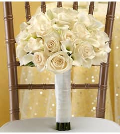All White Bouquet. An arrangement by Blessing and Blooms Florist.