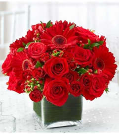All Red Centerpiece in a Vase. An arrangement by Blessing and Blooms Florist.