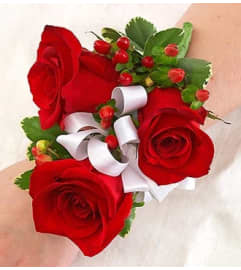 All Red Corsage. An arrangement by Blessing and Blooms Florist.