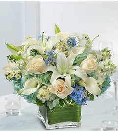 Blue and White Centerpiece Package. An arrangement by Graceland Florist.