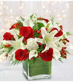 Holiday Centerpiece. An arrangement by Blessing and Blooms Florist.