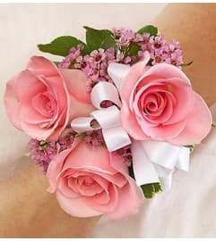 Pink Corsage. An arrangement by Blessing and Blooms Florist.