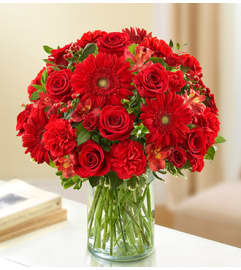 Sincerest Sorrow - All Red. An arrangement by Blessing and Blooms Florist.