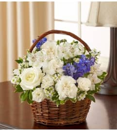 Peace, Prayers and Blessings - Blue and White. An arrangement by Blessing and Blooms Florist.