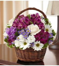 Peace, Prayers and Blessings - Lavender and Whi. An arrangement by Blessing and Blooms Florist.