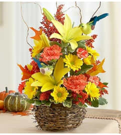Autumn Birds Nest of Flowers™. An arrangement by Blessing and Blooms Florist.