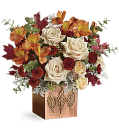 Teleflora's Shimmering Leaves Bouquet. An arrangement by Pompano Beach Floral.