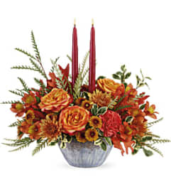 Teleflora's Bountiful Blessings Centerpiece PM. An arrangement by Margaret's Florist.