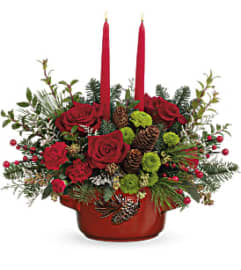 Teleflora's Artisanal Pinecone Centerpiece. An arrangement by Margaret's Florist.