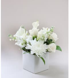 Sheer Light. An arrangement by Midtown Florist.