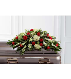 The FTD® Sincerity™ Casket Spray. An arrangement by Mystic Garden Floral.