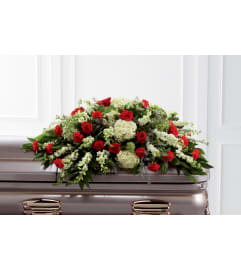 The FTD® Sincerity™ Casket Spray. An arrangement by Syd Kemsley Florist.