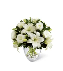 The FTD® White Elegance™ Bouquet. An arrangement by Mystic Garden Floral.