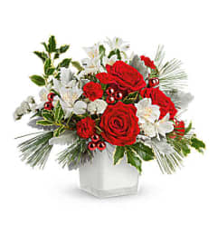 The Teleflora's Festive Elegance Bouquet. An arrangement by Marivel's Florist and Gifts.