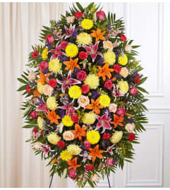 Sympathy Standing Spray - Bright XL. An arrangement by Garden of Eden Floral.