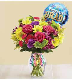 It's Your Day Bouquet® for Graduation. An arrangement by Susana's Flowers.