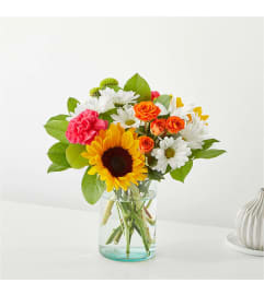 The Sun-drenched Blooms. An arrangement by Country Cousins Flower Shop.