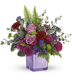 Teleflora's Purple Serenity Bouquet. An arrangement by Flower Trends Florists.