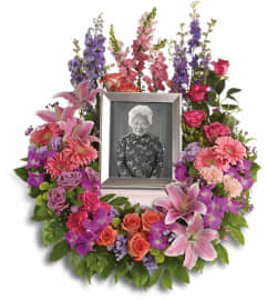 In Memoriam Wreath. An arrangement by Wasaga Flowers.