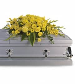Brighter Blessings Casket Spray. An arrangement by Vaillant Florist.