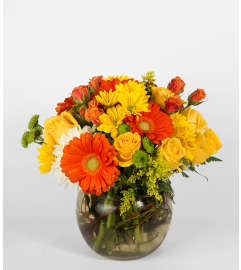 Fireside. An arrangement by Masters and Company Florist.