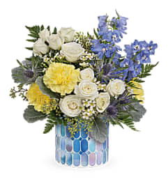 The Teleflora's Dreaming of Blue Bouquet. An arrangement by Country Cousins Flower Shop.
