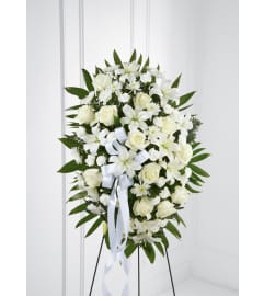 The FTD® Exquisite Tribute™ Spray. An arrangement by Mystic Garden Floral.