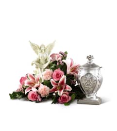 The FTD® Divinity™ Urn Arrangement. An arrangement by Mystic Garden Floral.