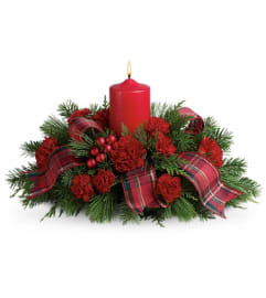 Family Celebration. An arrangement by White's Flowers.