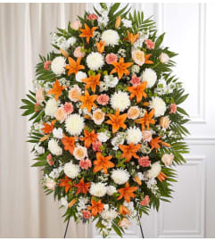 Peach, Orange and White Sympathy Standing Spray XL. An arrangement by Garden of Eden Floral.