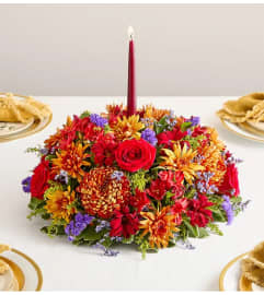 Brilliant Autumn™ Centerpiece. An arrangement by Sicola's Florist. Brilliant Autumn™ Centerpiece. An arrangement by Sicola's Florist.